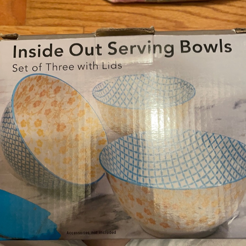 Three serving bowls with lids